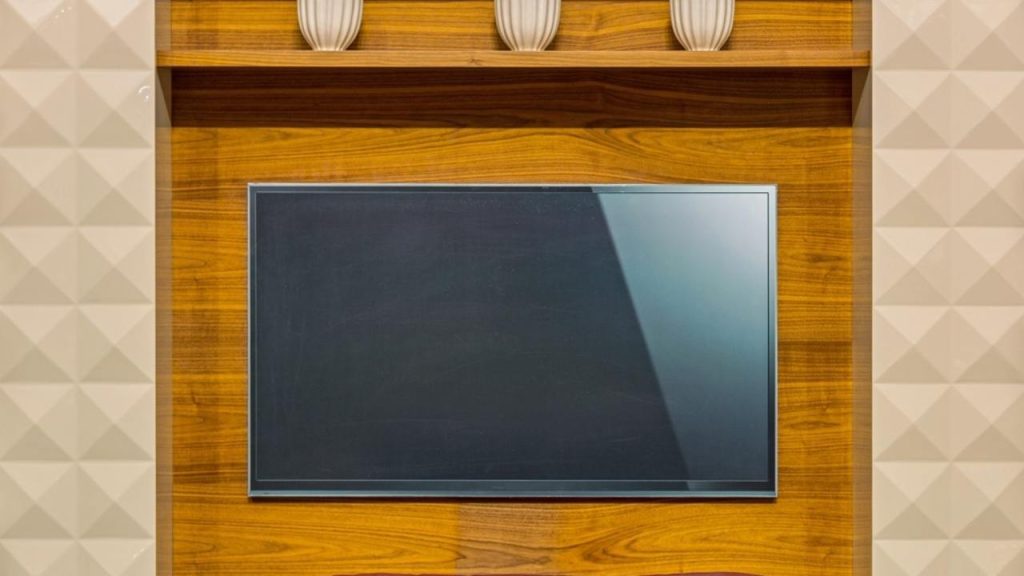 Televízor zabudovaný do nábytku v obývačke ako súčasť interiéru