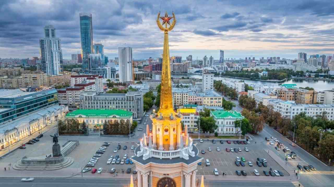 Yekaterinburg City Administration or City Hall and Central square at summer evening. Evening city in the summer sunset, Aerial View. Top view of city administration in Ekaterinburg